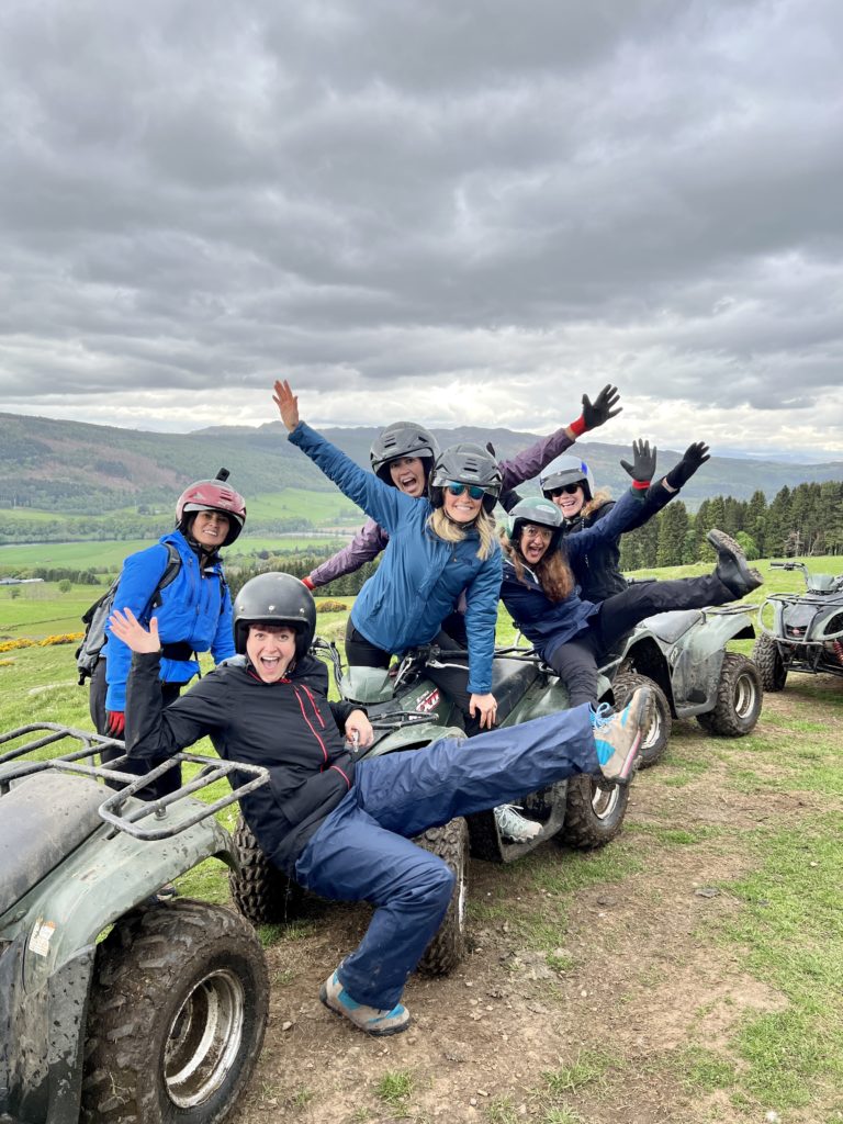 women acting goofy on ATVs